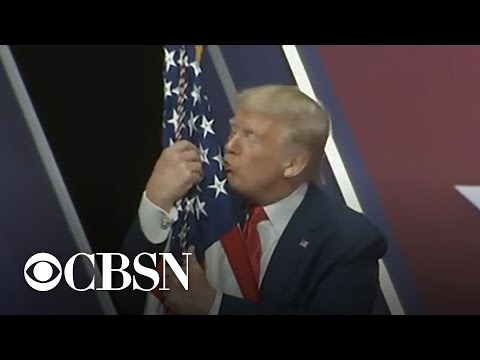 Trump Hugging American Flag Handblown Glass Ornament